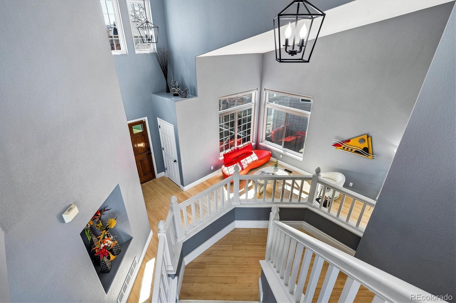 4143 South Deframe Court Morrison, CO 80465 - Photo 29 of 48 a view of an entryway with wooden floor