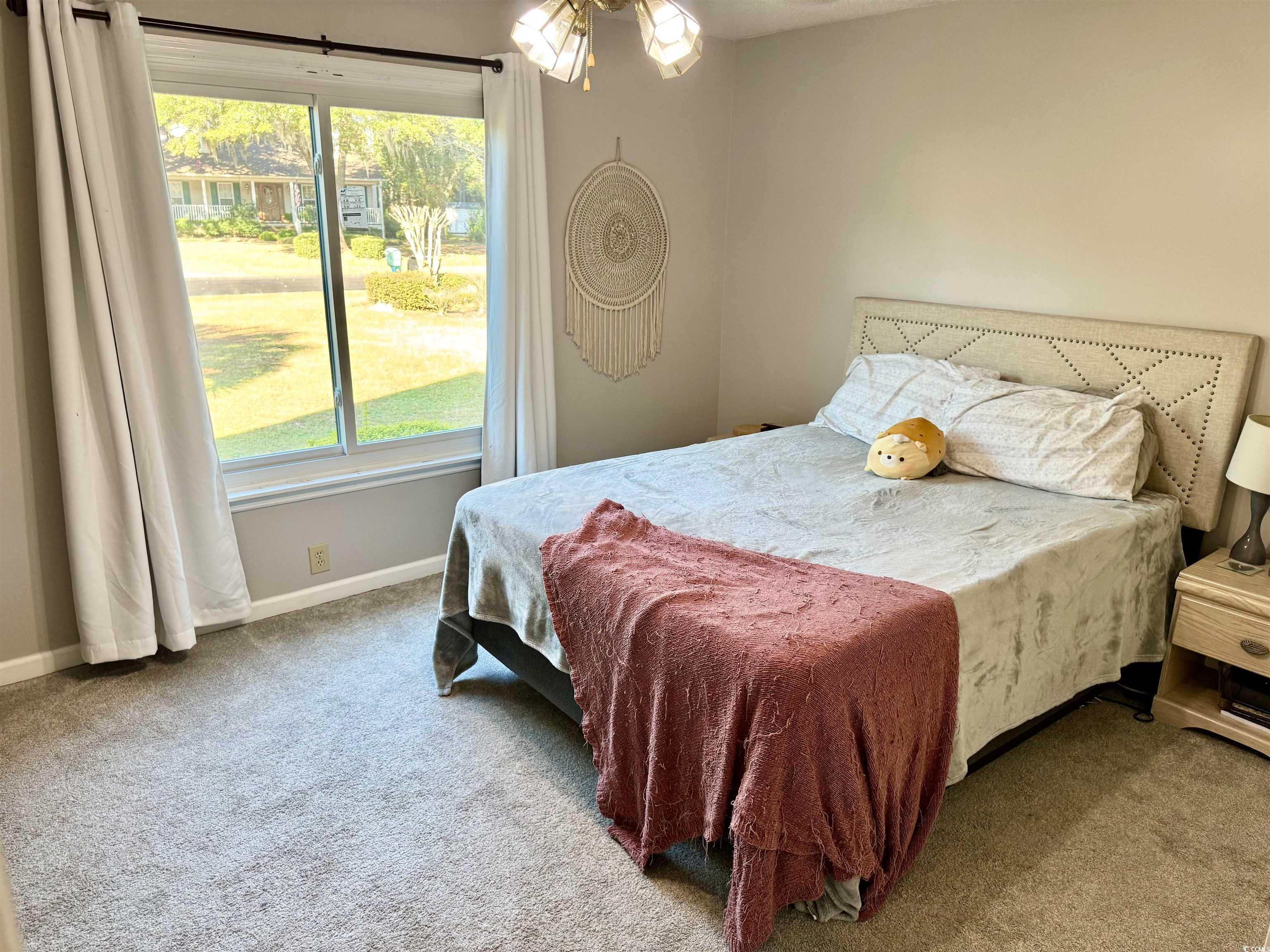40 Governor Boone Lane Georgetown, SC 29440 - Photo 8 of 33 Carpeted bedroom featuring baseboards