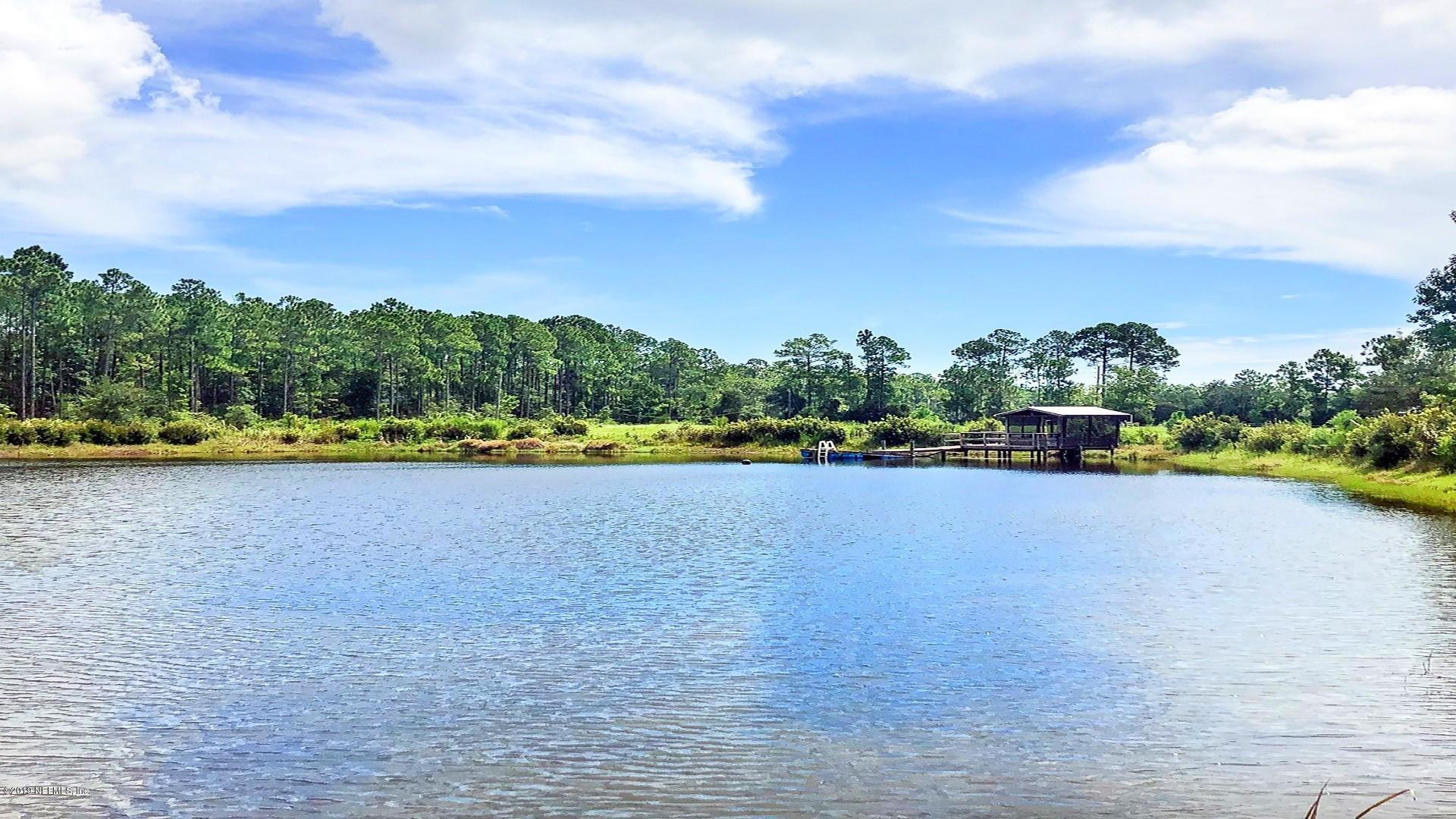 13516 Boney Road Jacksonville, FL 32226 - Photo 13 of 34 013_View from Across Lake