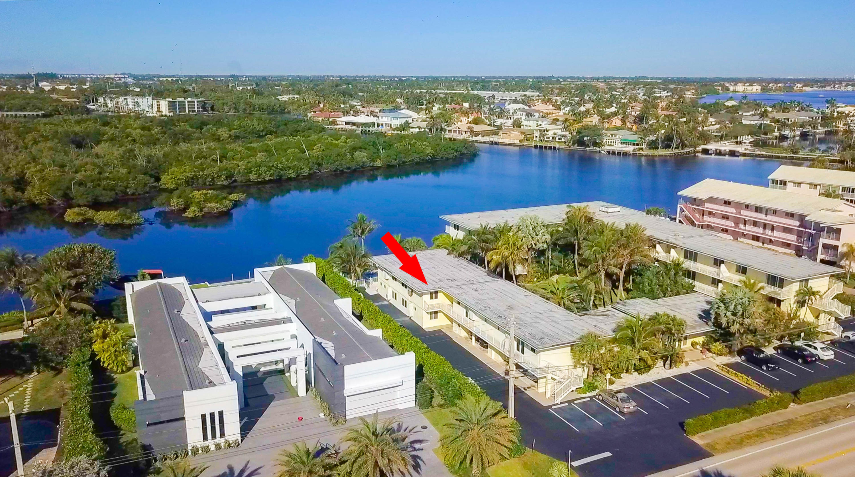 6520 North Ocean Boulevard, Unit 28 Ocean Ridge, FL 33435 - Photo 24 of 32 an aerial view of a house with a ocean view