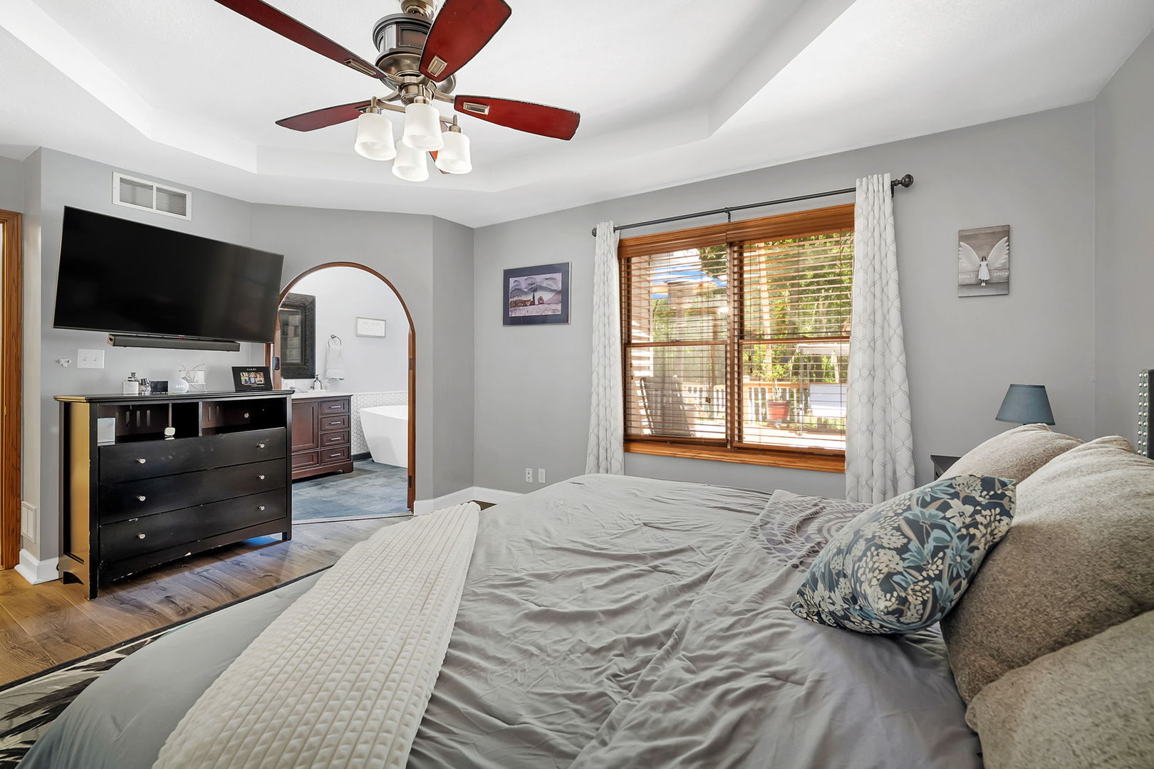 24700 West Canal Road Channahon, IL 60410 - Photo 15 of 30 a bedroom with a bed and a flat screen tv