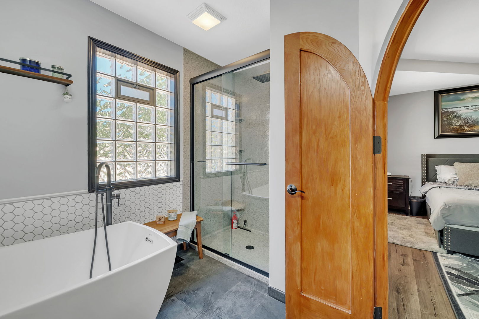 24700 West Canal Road Channahon, IL 60410 - Photo 17 of 30 a bathroom with a bathtub and a shower