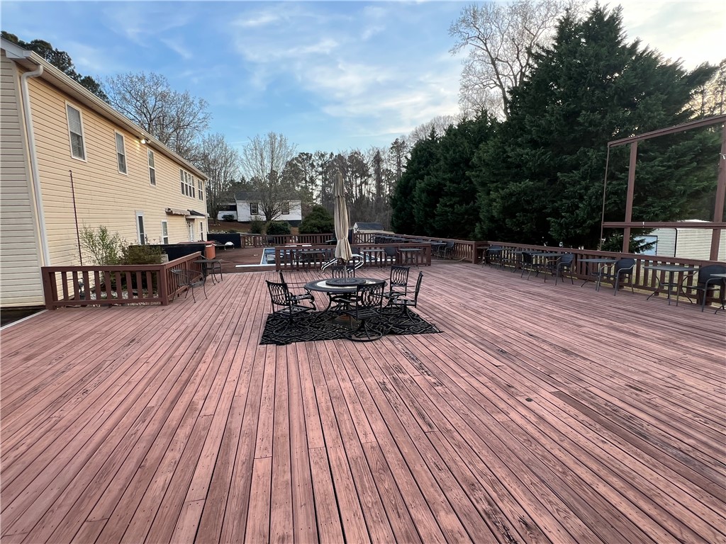 521 Calhoun Shores Parkway Calhoun Falls, SC 29628 - Photo 30 of 39 Expansive outdoor deck perfect for entertaining and enjoying tranquil surroundings.