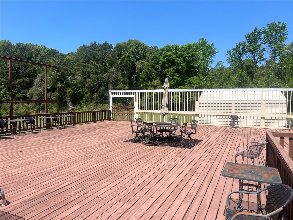 521 Calhoun Shores Parkway Calhoun Falls, SC 29628 - Photo 33 of 39 Expansive outdoor deck offers ample space for entertaining amidst serene surroundings.