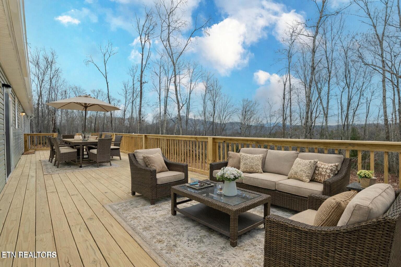 271 Charlie Newberry Road Lancing, TN 37770 - Photo 41 of 50 Wooden deck with woodland view