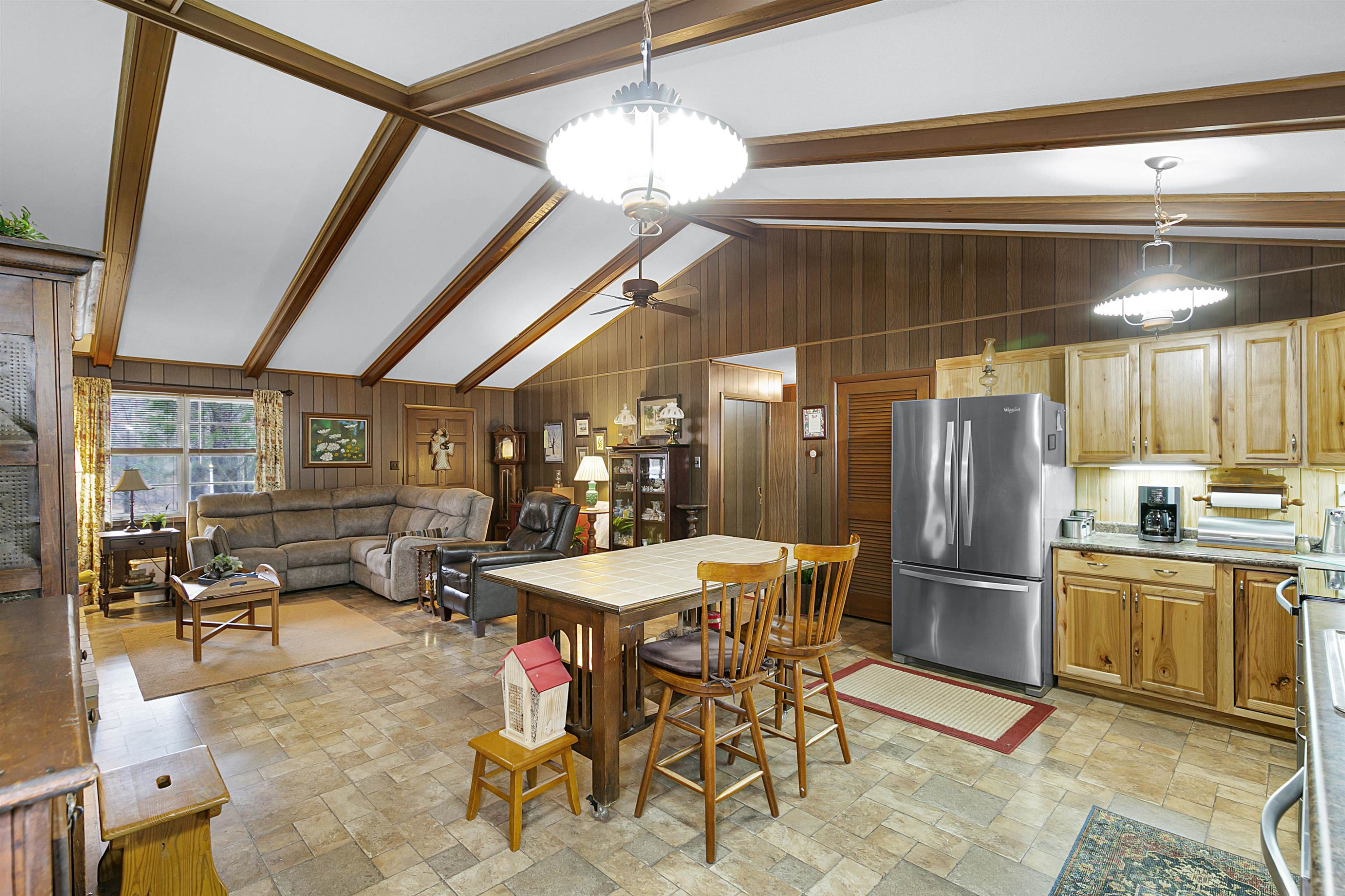121 Odell Road Jackson, TN 38301 - Photo 6 of 18 a kitchen with stainless steel appliances kitchen island granite countertop furniture and a refrigerator