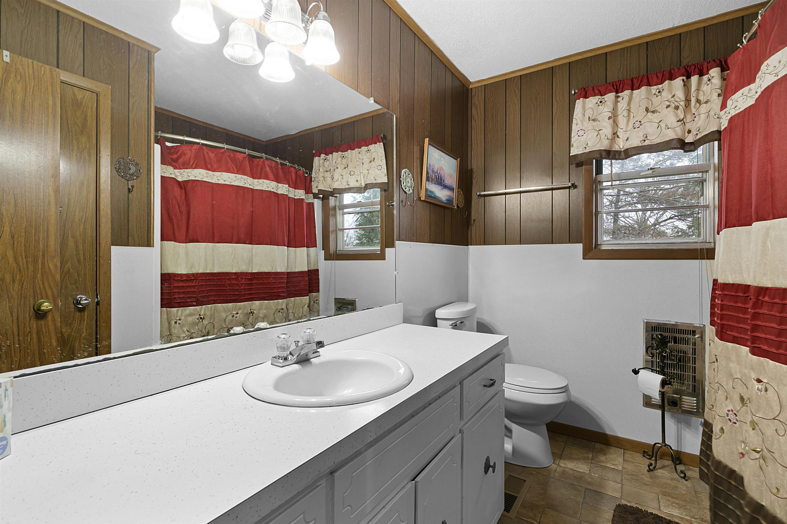121 Odell Road Jackson, TN 38301 - Photo 9 of 18 a bathroom with a sink and a mirror