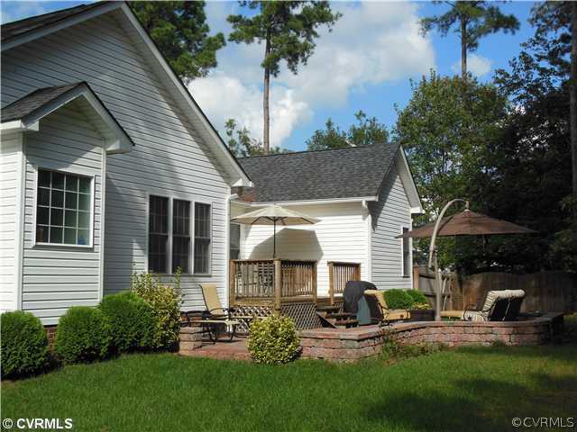 811 Club Ridge Terrace Chester, VA 23836 - Photo 17 of 21 a front view of house with yard and outdoor seating