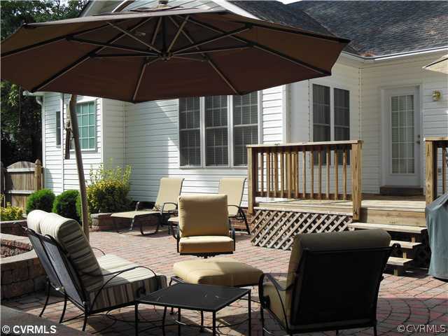 811 Club Ridge Terrace Chester, VA 23836 - Photo 18 of 21 a view of an outdoor sitting area with furniture and backyard