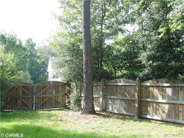 811 Club Ridge Terrace Chester, VA 23836 - Photo 20 of 21 a view of a backyard