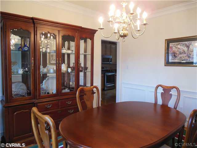 811 Club Ridge Terrace Chester, VA 23836 - Photo 3 of 21 a view of a dining room with furniture window and outside view