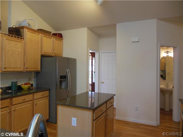 811 Club Ridge Terrace Chester, VA 23836 - Photo 8 of 21 a kitchen with stainless steel appliances granite countertop a refrigerator and a stove top oven