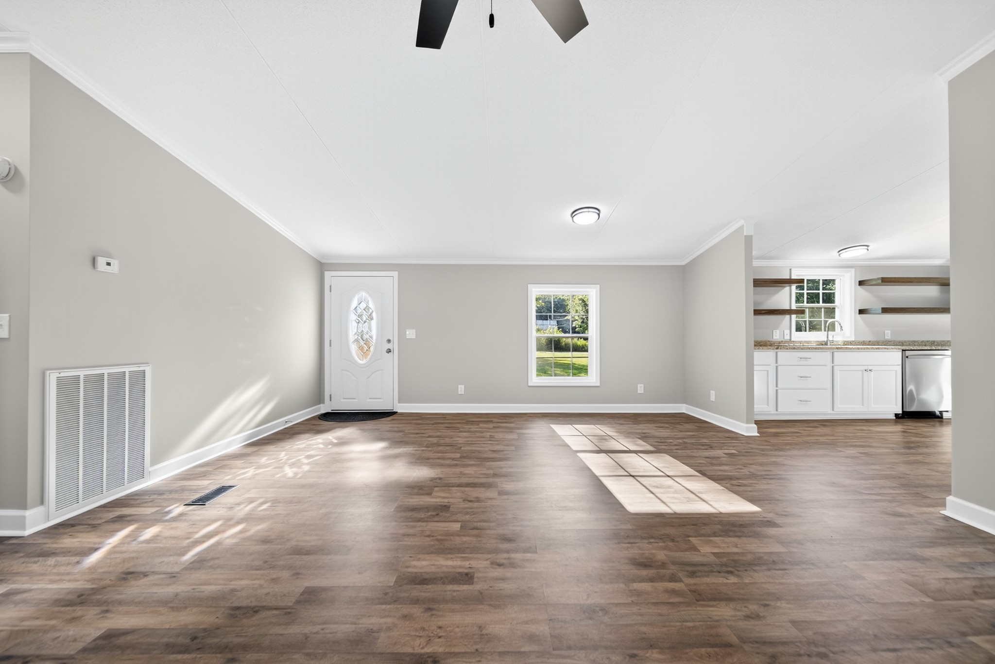 4675 Wills Road Cross Plains, TN 37049 - Photo 16 of 69 a view of an empty room with a window and wooden floor