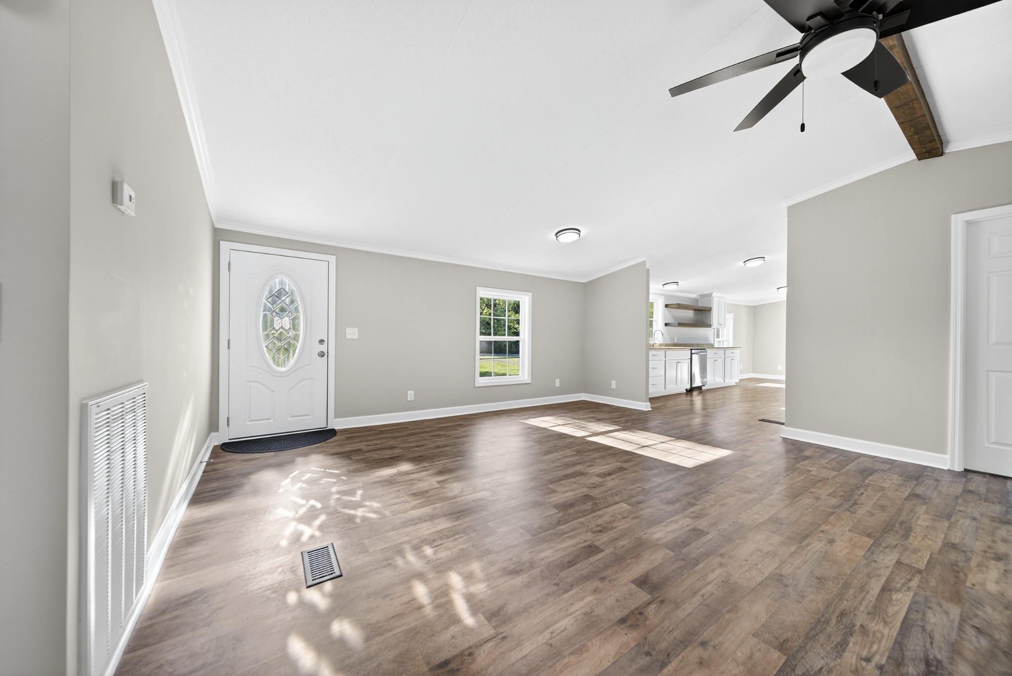 4675 Wills Road Cross Plains, TN 37049 - Photo 17 of 69 a view of empty room with wooden floor and fan