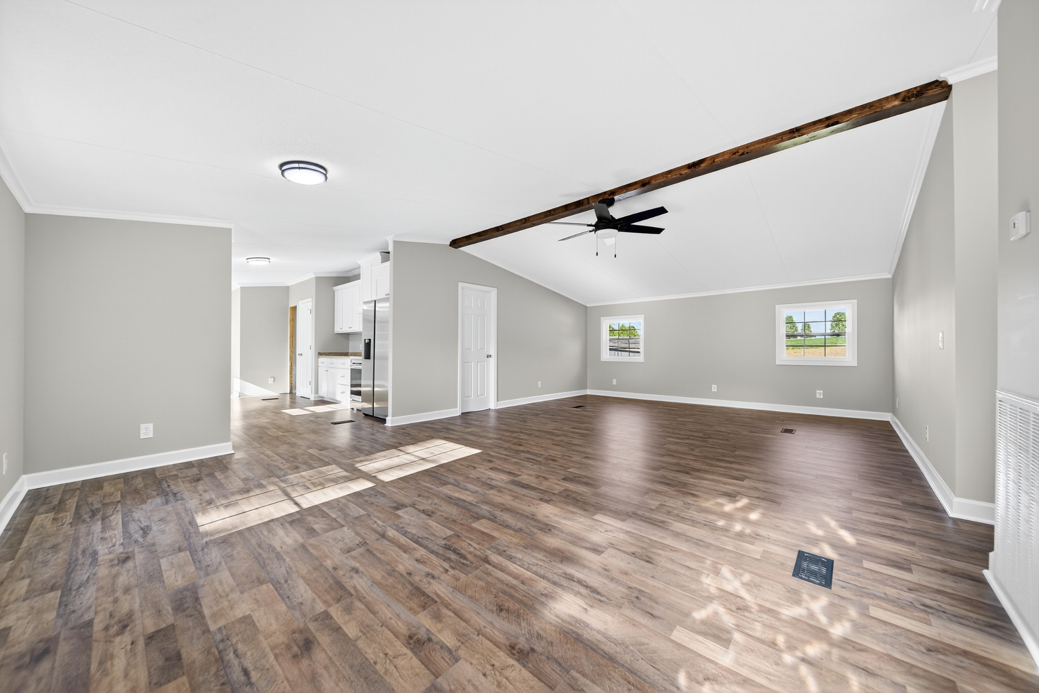 4675 Wills Road Cross Plains, TN 37049 - Photo 18 of 69 a view of a livingroom with wooden floor and staircase