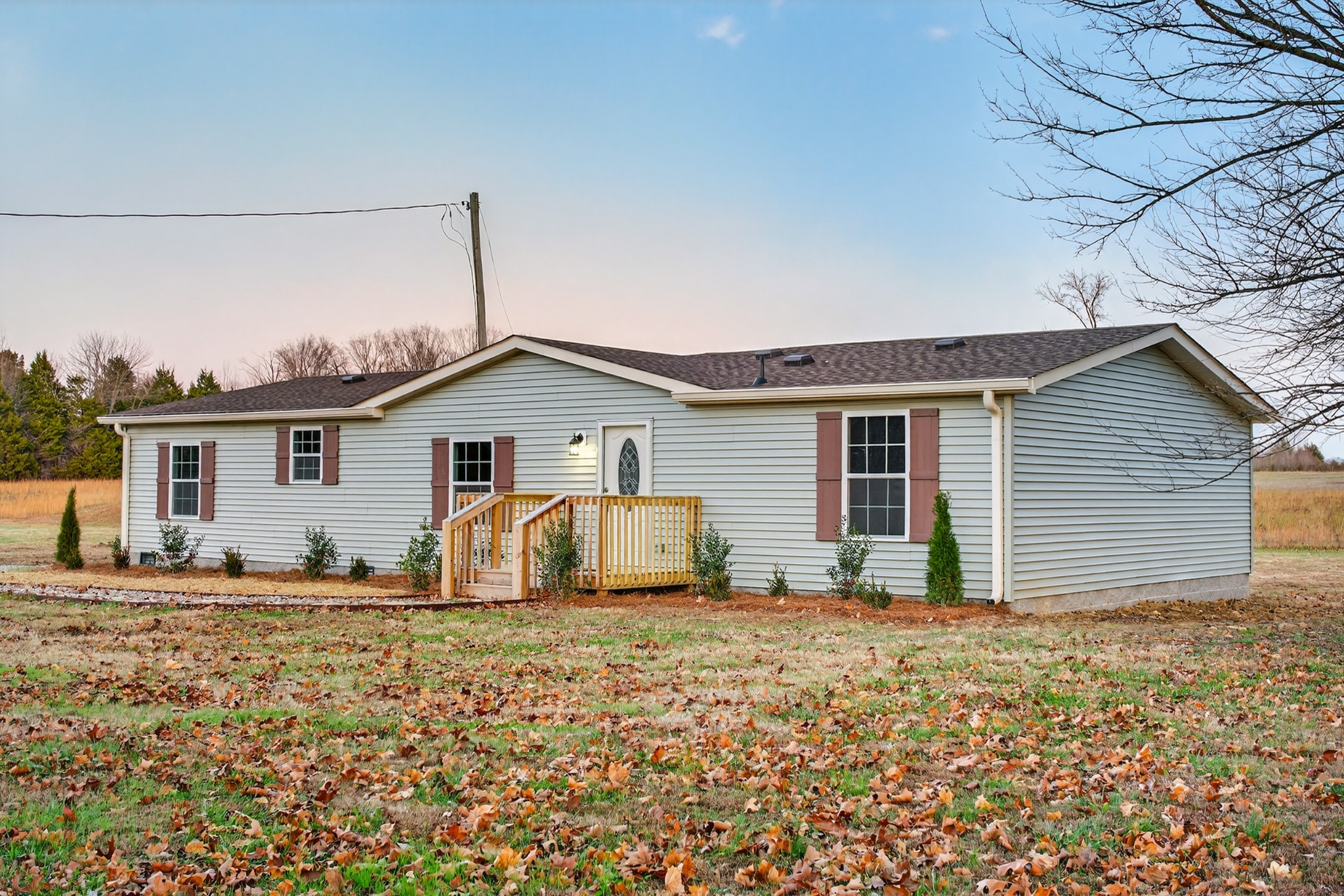 4675 Wills Road Cross Plains, TN 37049 - Photo 3 of 69 a house with trees in the background