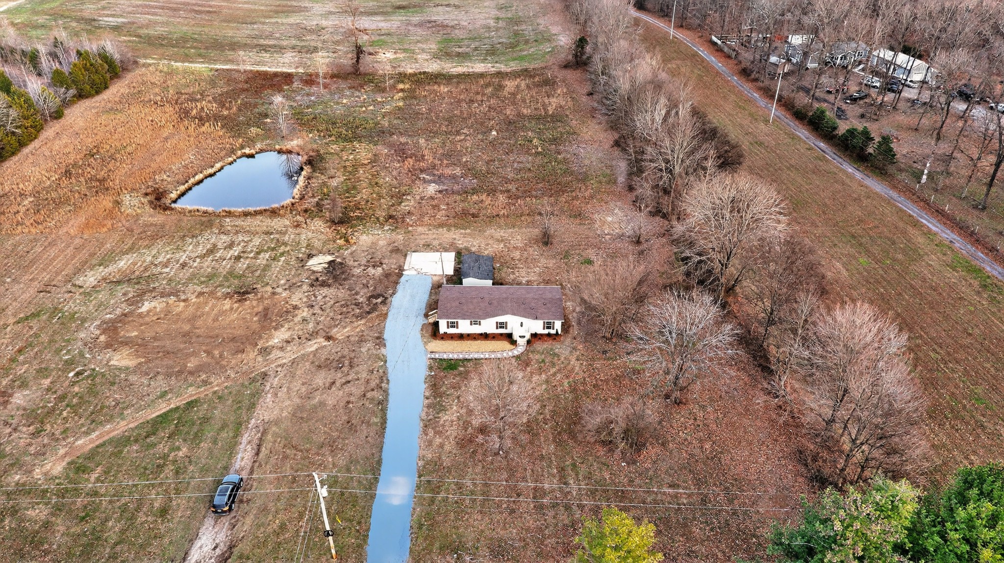 4675 Wills Road Cross Plains, TN 37049 - Photo 62 of 69 a aerial view of a house with yard