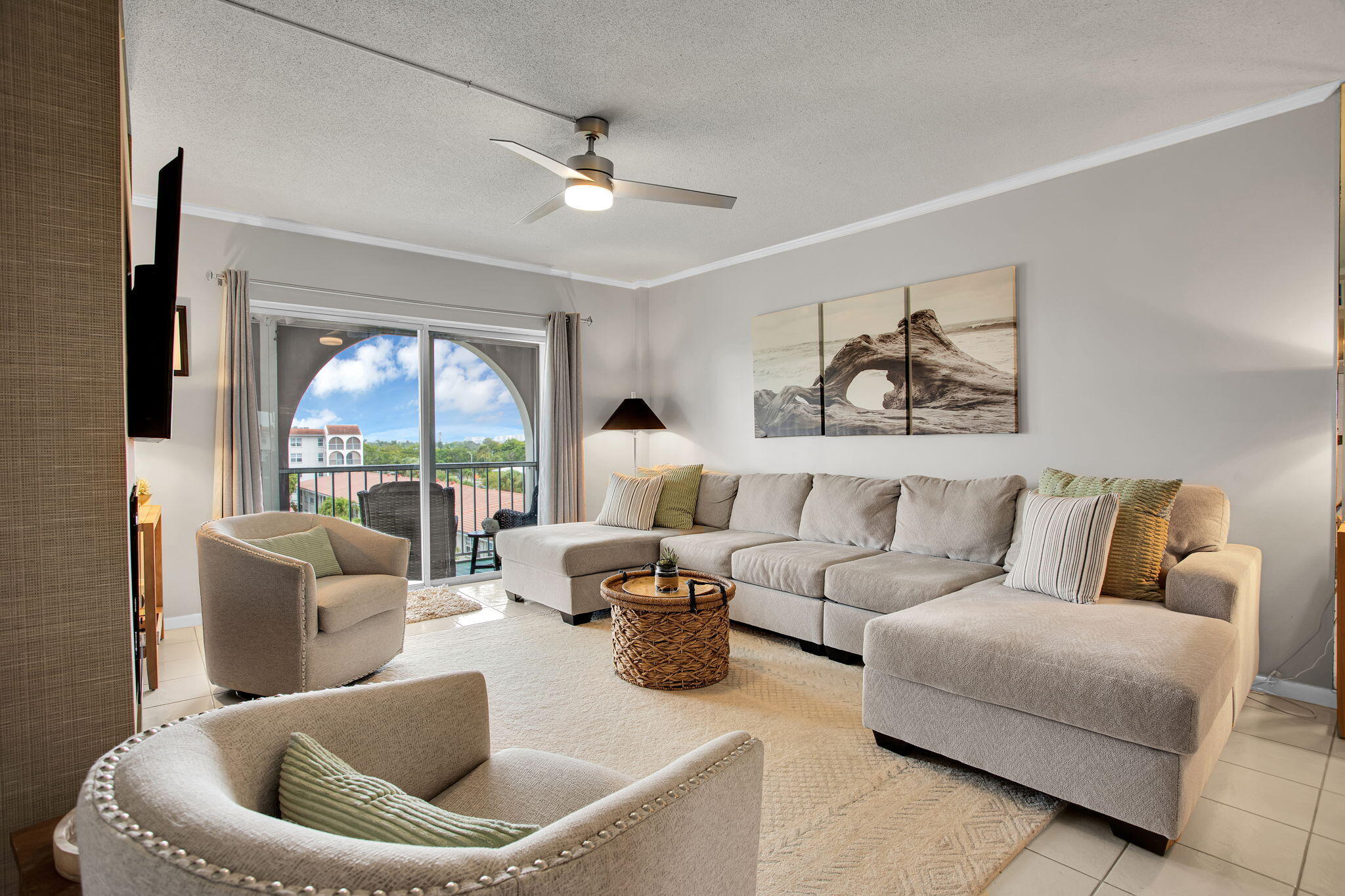 250 Northeast 20th Street, Unit 5240 Boca Raton, FL 33431 - Photo 17 of 49 a living room with furniture and a large window