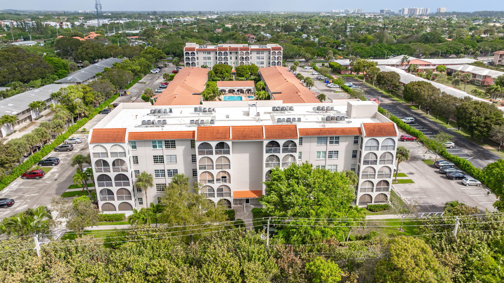 250 Northeast 20th Street, Unit 5240 Boca Raton, FL 33431 - Photo 35 of 49 an aerial view of residential building and parking space