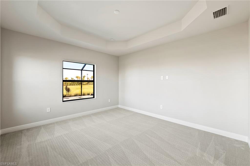 3952 Pegasus Way Naples, FL 34120 - Photo 25 of 50 an empty room with a window