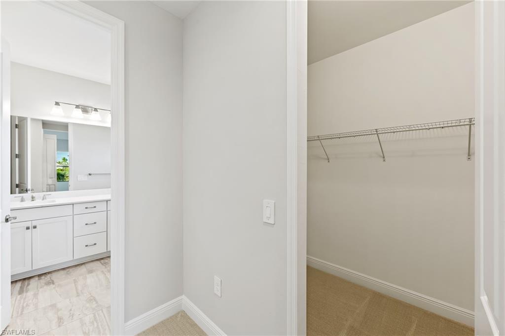 3952 Pegasus Way Naples, FL 34120 - Photo 28 of 50 a bathroom with a shower and a sink