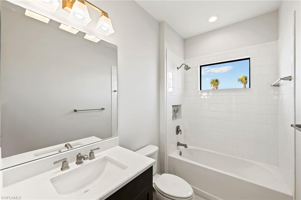 3952 Pegasus Way Naples, FL 34120 - Photo 30 of 50 a bathroom with a sink toilet tub and shower