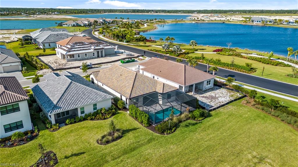 3952 Pegasus Way Naples, FL 34120 - Photo 3 of 50 an aerial view of a house with a ocean view