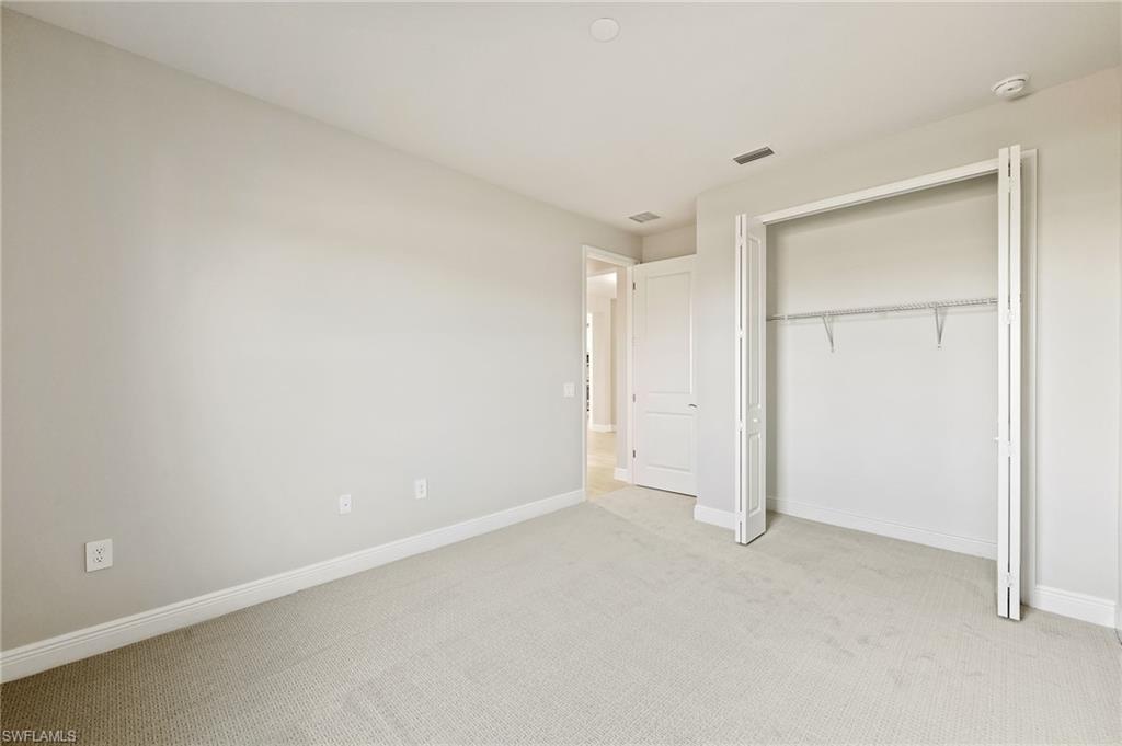 3952 Pegasus Way Naples, FL 34120 - Photo 32 of 50 a view of an empty room