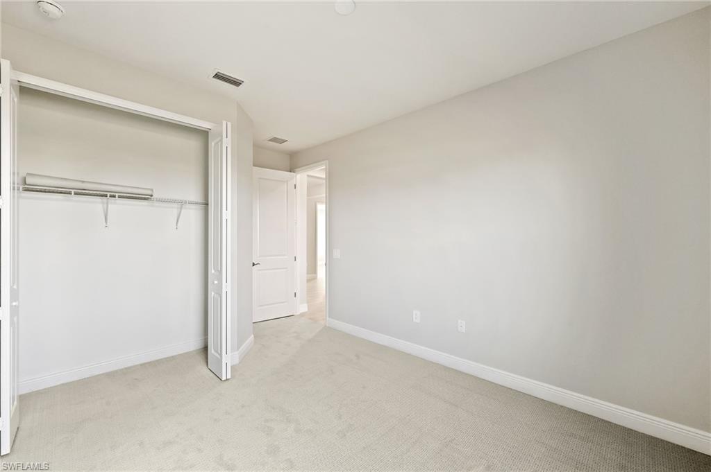 3952 Pegasus Way Naples, FL 34120 - Photo 35 of 50 a view of an empty room