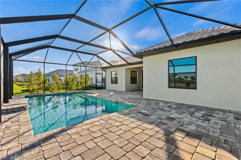 3952 Pegasus Way Naples, FL 34120 - Photo 41 of 50 a view of a backyard