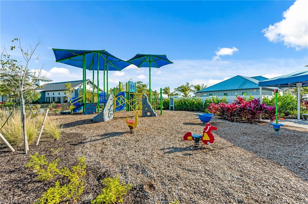 3952 Pegasus Way Naples, FL 34120 - Photo 46 of 50 a view of a outdoor space with porch and chairs