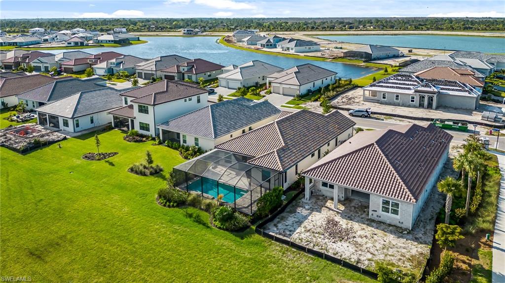 3952 Pegasus Way Naples, FL 34120 - Photo 49 of 50 an aerial view of residential houses with outdoor space and river