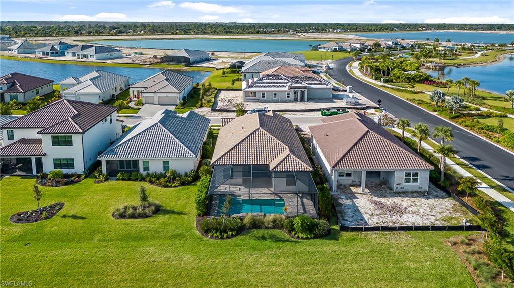3952 Pegasus Way Naples, FL 34120 - Photo 50 of 50 a aerial view of a house with outdoor space and swimming pool