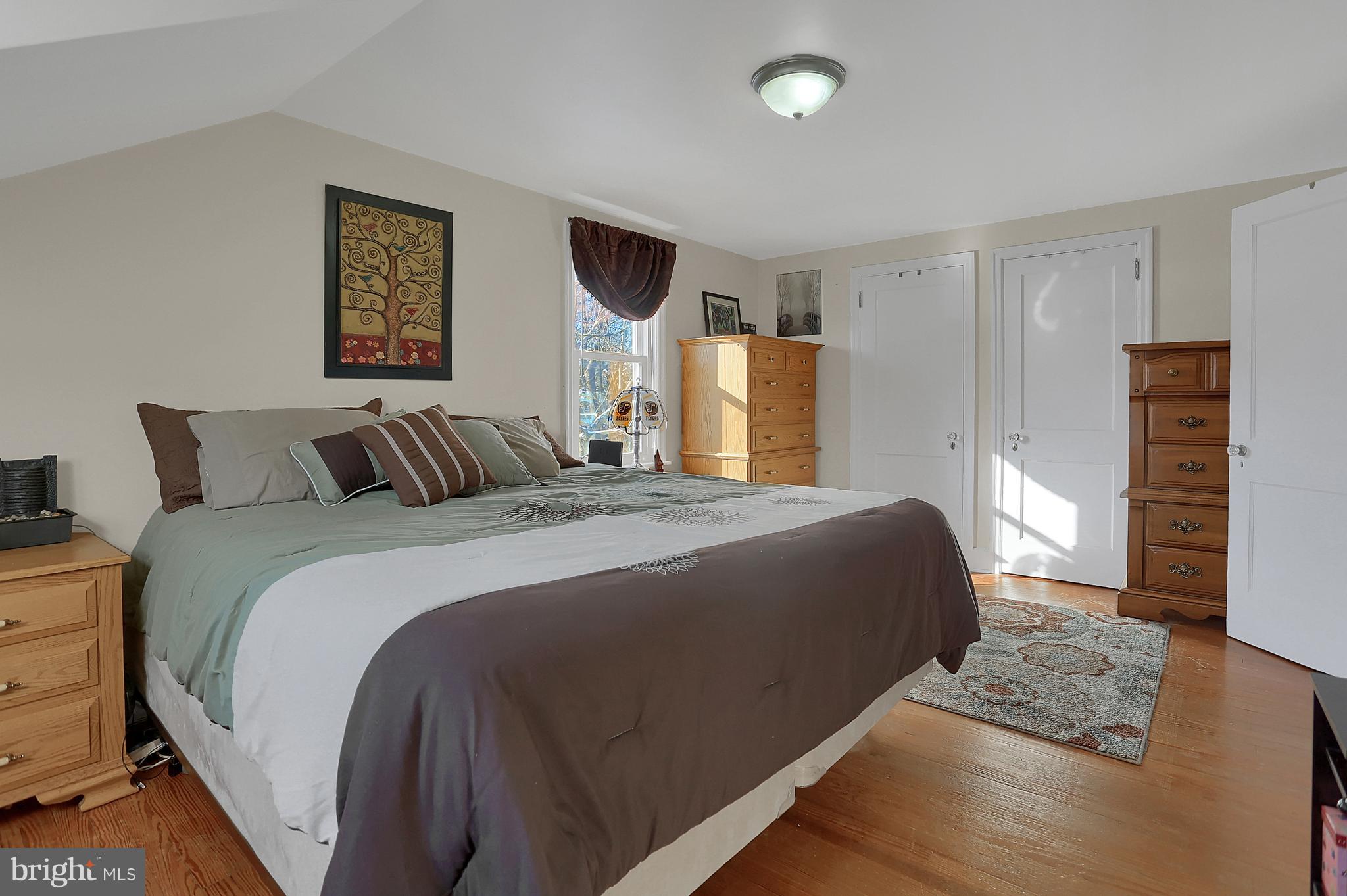 2380 Derry Road York, PA 17408 - Photo 15 of 34 a bedroom with a bed and a night stand