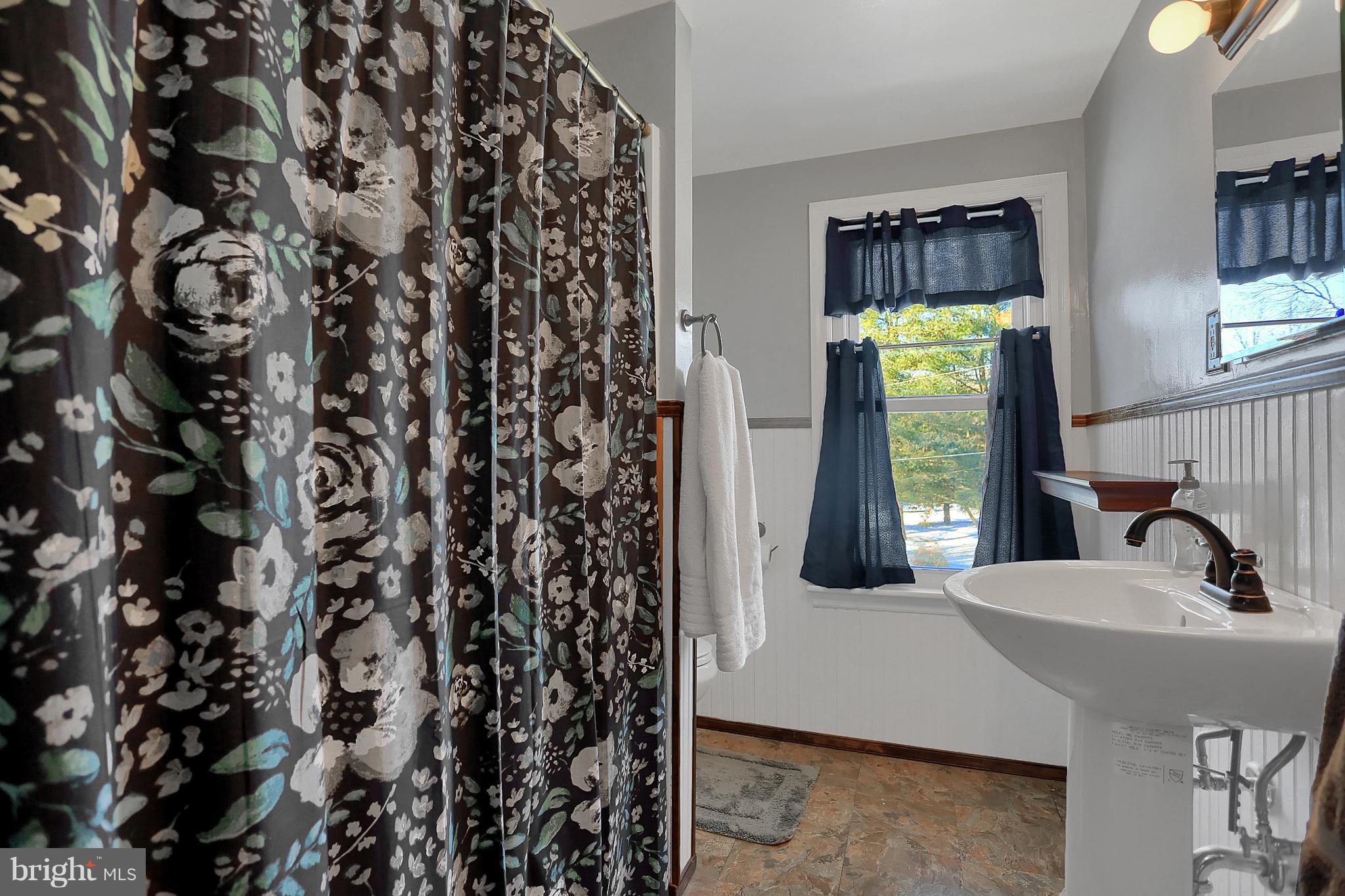 2380 Derry Road York, PA 17408 - Photo 17 of 34 a en suite bathroom with a sink and a mirror