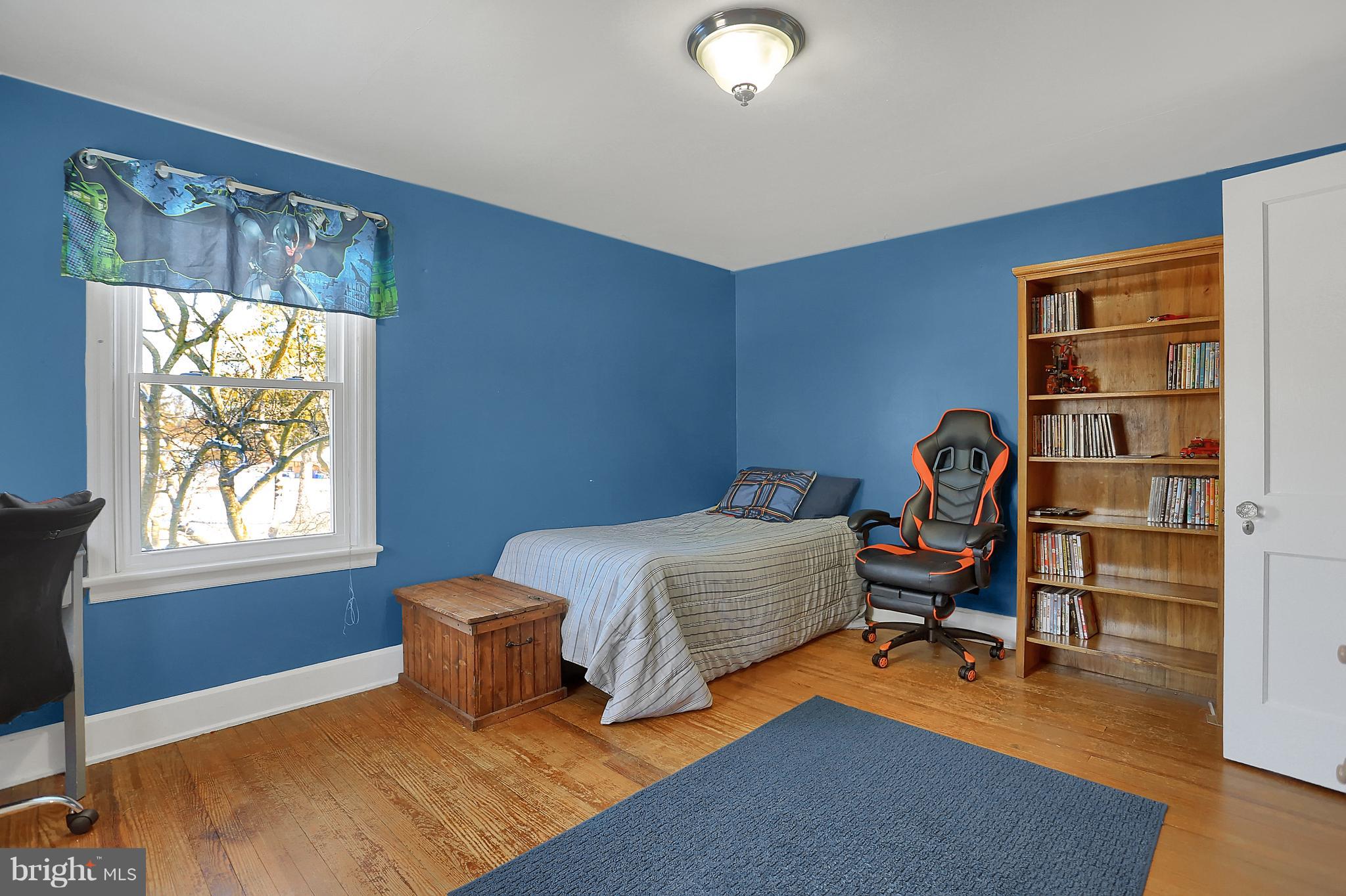 2380 Derry Road York, PA 17408 - Photo 20 of 34 a bedroom with furniture and a wooden floor