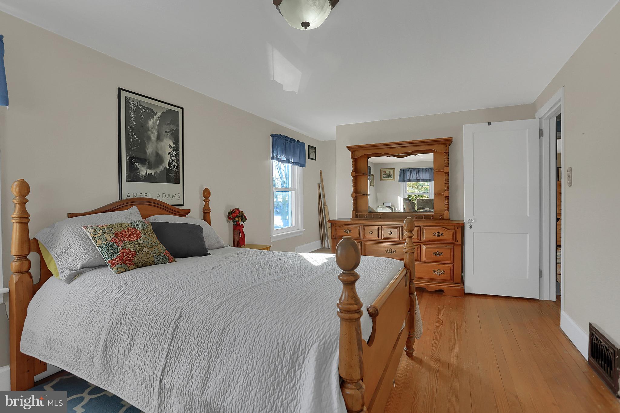 2380 Derry Road York, PA 17408 - Photo 24 of 34 a bedroom with a bed and wooden floor