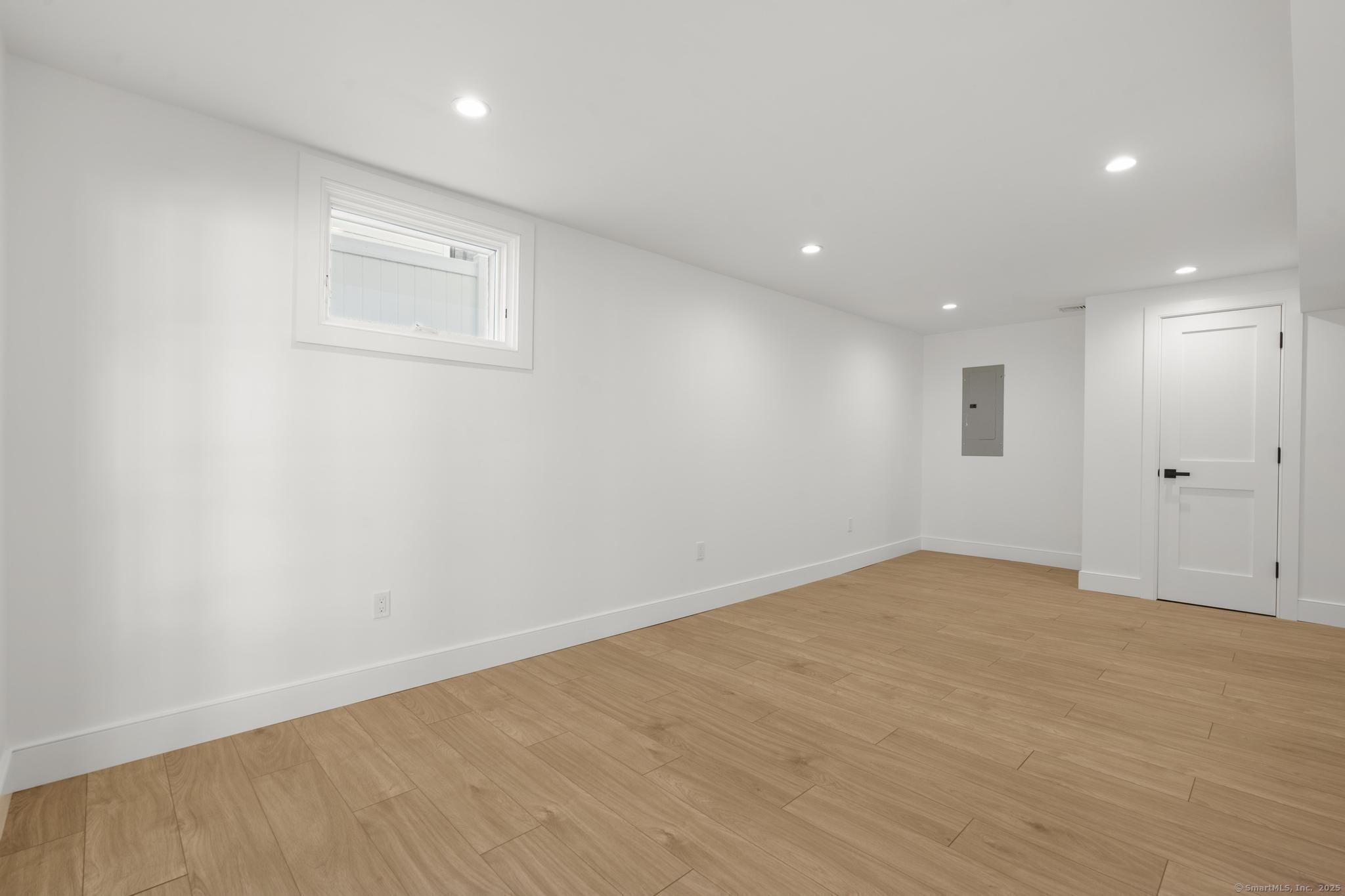 18 Sound Beach Avenue Greenwich, CT 06870 - Photo 22 of 36 an empty room with an entryway