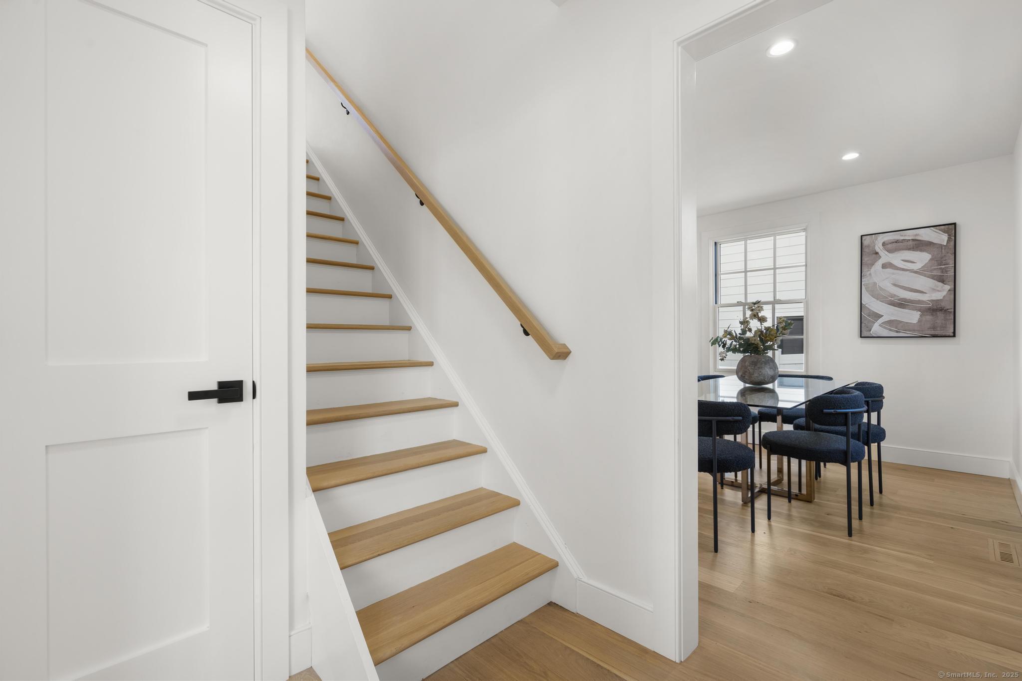 18 Sound Beach Avenue Greenwich, CT 06870 - Photo 10 of 36 a view of a livingroom with wooden floor and furniture