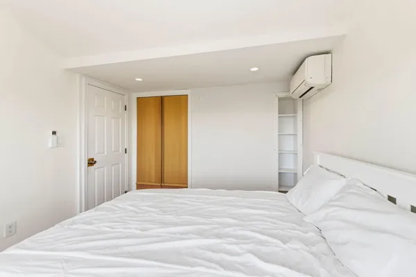 a bathroom with a toilet a sink and shower