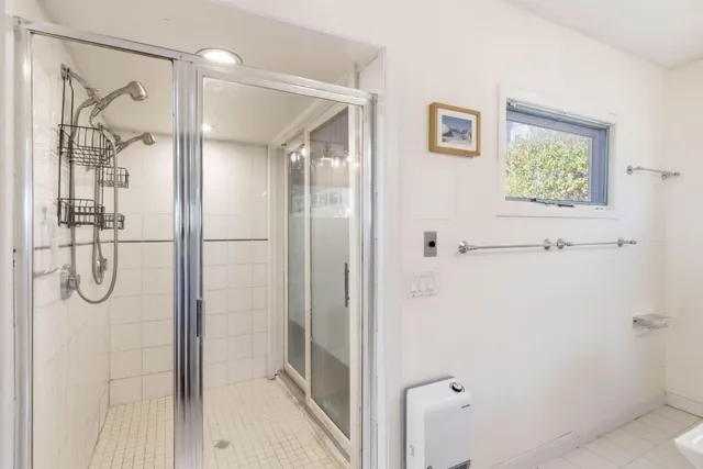 a view of storage and utility room with washer and dryer