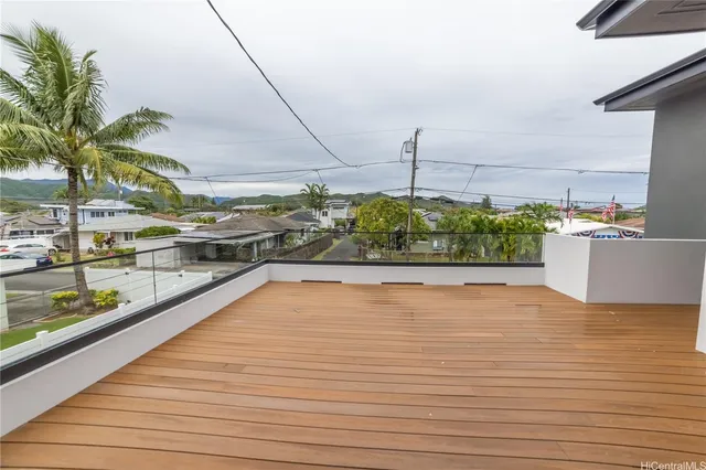 a view of a terrace with wooden floor