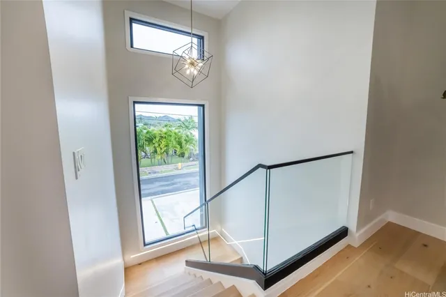 a view of a house with a backyard and a patio