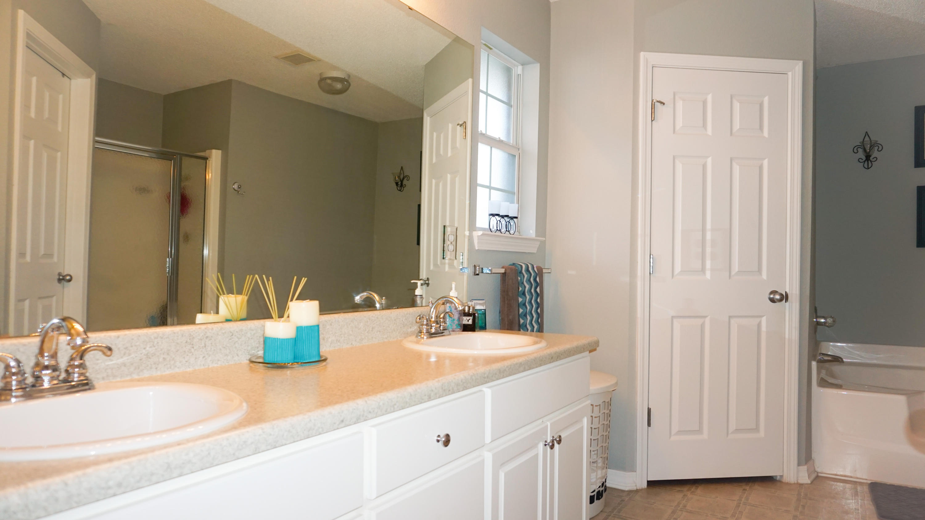 2126 Hagood Loop Crestview, FL 32536 - Photo 10 of 18 a bathroom with a sink and a mirror