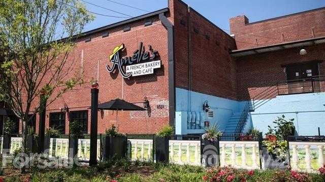 4913 Park Road, Unit D Charlotte, NC 28209 - Photo 27 of 32 a street sign on a pole on a street