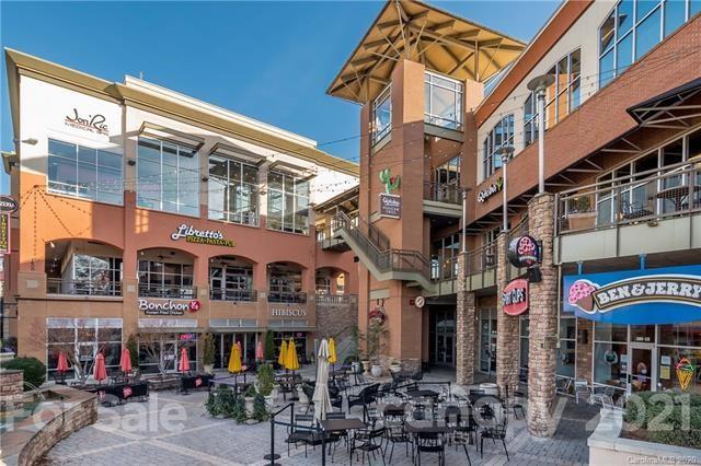 4913 Park Road, Unit D Charlotte, NC 28209 - Photo 30 of 32 a view of a building with a street