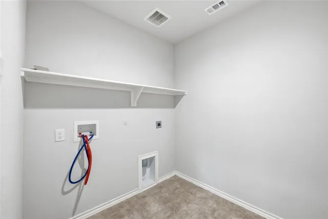 an empty room with a empty space and windows