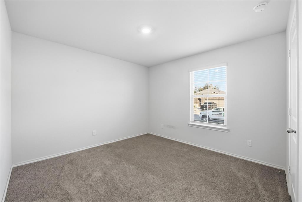 549 Bronze Circle East Springtown, TX 76082 - Photo 18 of 29 an empty room with windows
