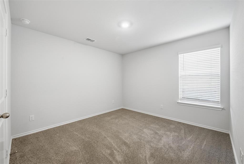 549 Bronze Circle East Springtown, TX 76082 - Photo 20 of 29 an empty room with a window