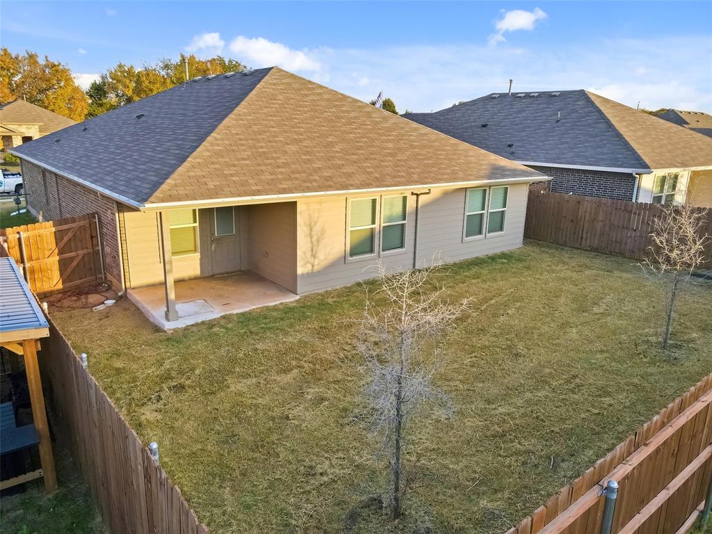 549 Bronze Circle East Springtown, TX 76082 - Photo 25 of 29 a view of a house with backyard